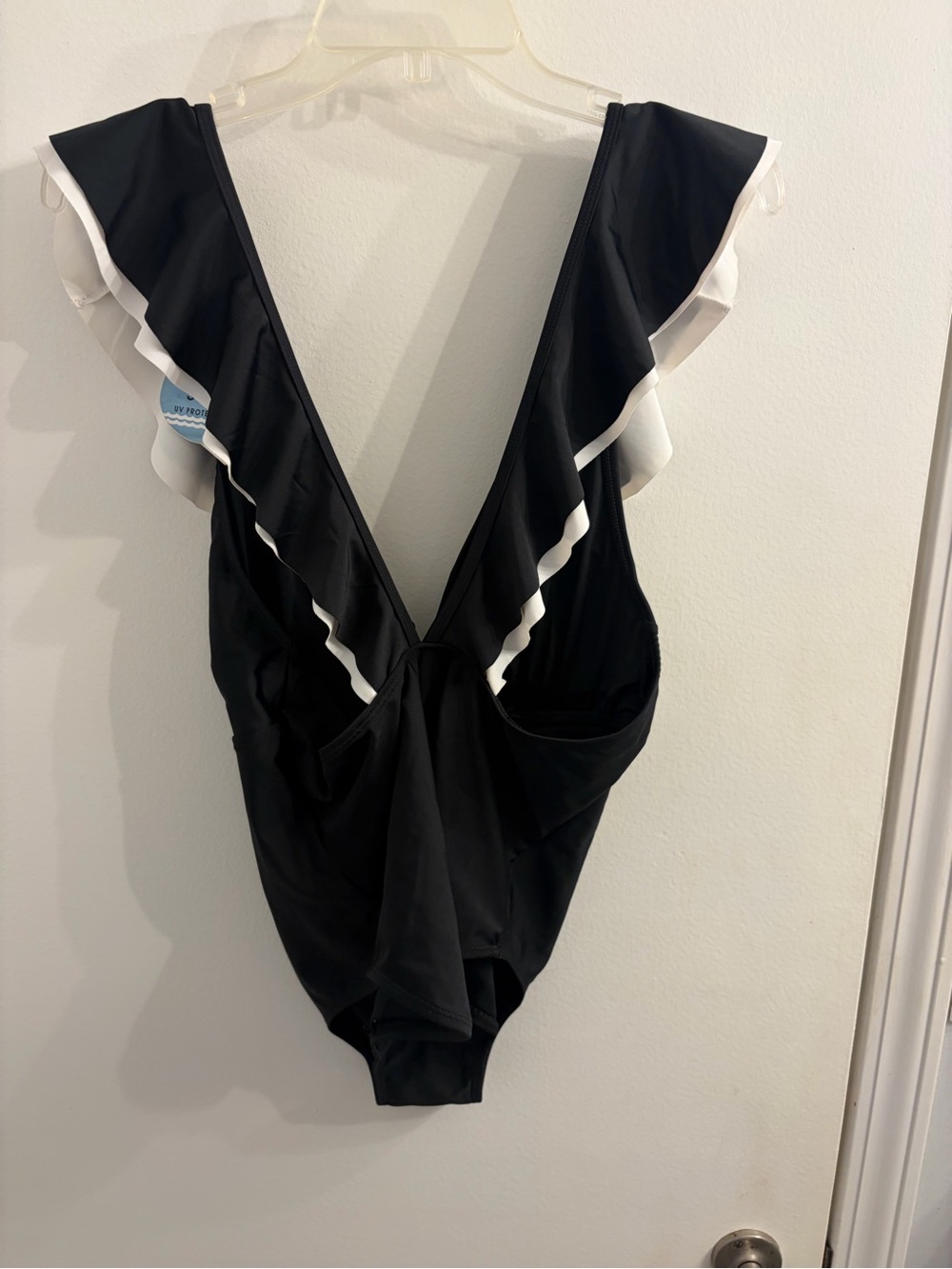 Black One-Piece Swimsuit with White Ruffle Trim